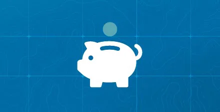 A piggy bank with a coin above it on a blue background.