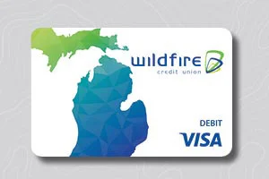 Michigan map design on white Wildfire Credit Union debit Visa card.