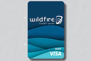 Dark blue Wildfire Credit Union debit Visa card with wave design.