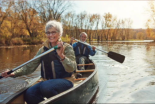 Couple out on a canoe enjoying nature