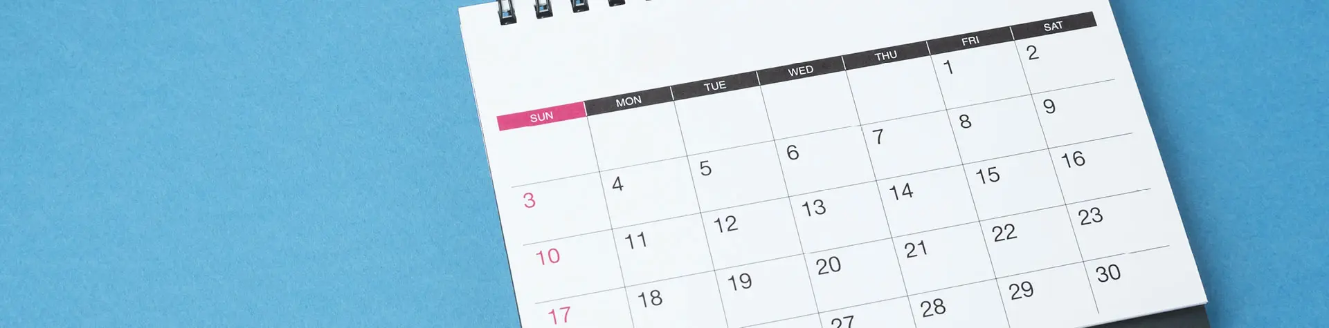 Calendar on a blue background.